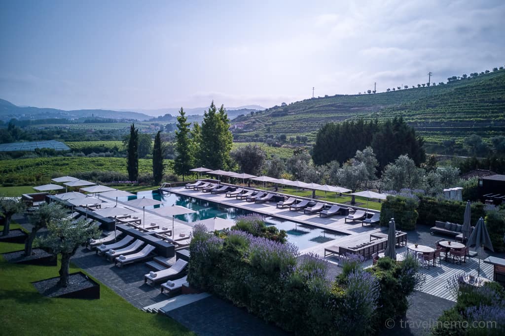 Six Senses Douro Valley pool with sunbathing lawn