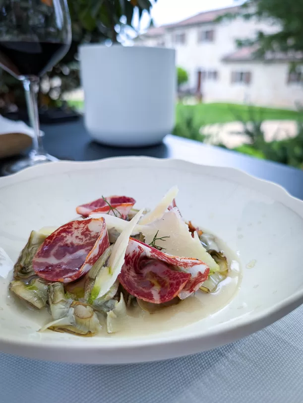 Istrian Gourmet Experiences: 3 Stellar Restaurants + Our Wishlist for Next Time 8 | travel memo Artichoke starter dish in Meneghetti restaurant Il Oliveto