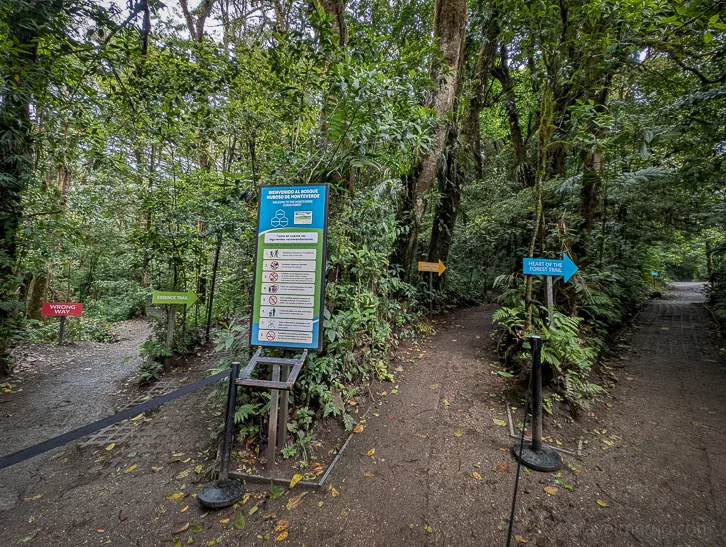 Information board at the entrance to the Monteverde Cloud Forest National Park with 3 hiking trails in the tropical cloud forest